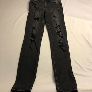 distressed black skinny jeans